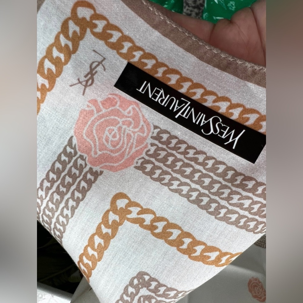 100% cotton Authentic YSL scarf. NWT (sticker tag comes standard)